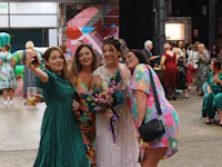 a group of bridesmaids posing for a photo